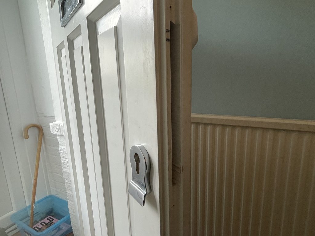 UPVC front door exterior view showing euro cylinder escutcheon Kensington W8